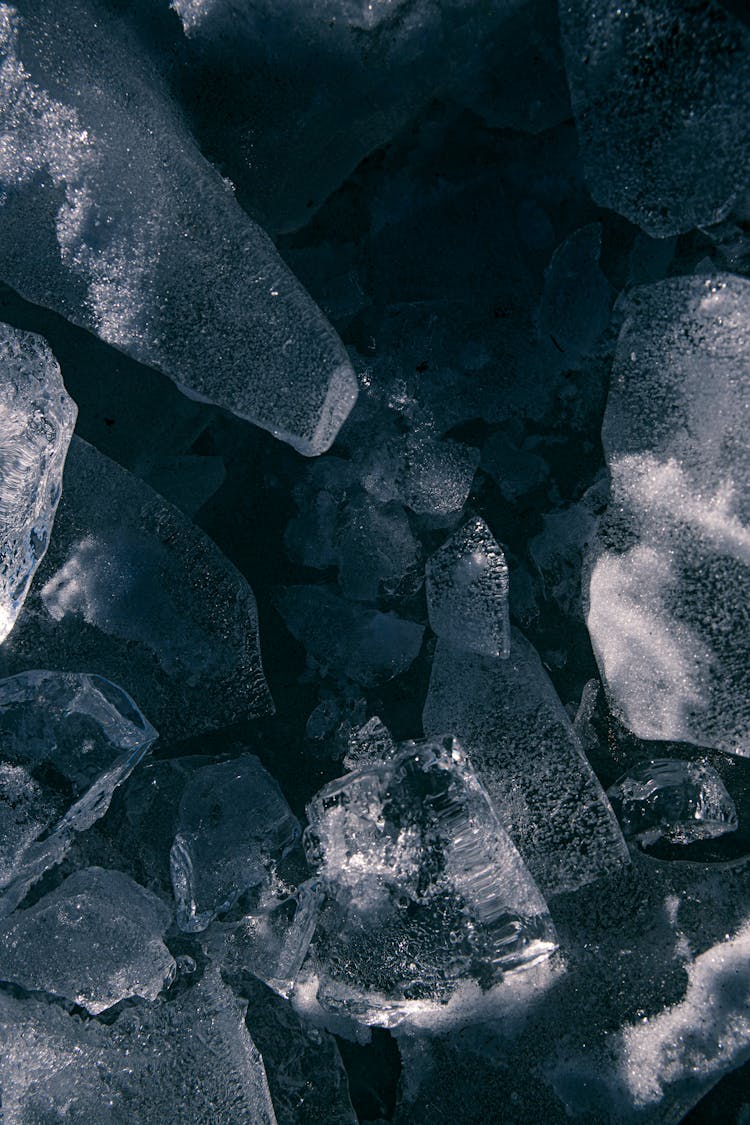 Abstract Uneven Surface Of Dark Gray Ice Pieces