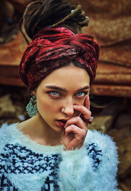 A Woman With Dreadlocks Wearing a Turban