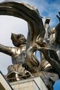 From below of fragment of Worker and Kolkhoz Woman sculpture located in Moscow under cloudy blue sky in sunny day