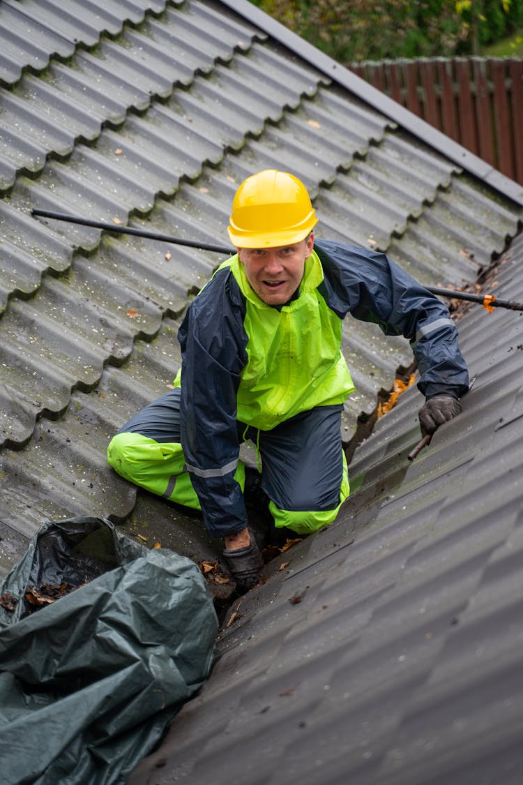 Construction Worker On The Roof 