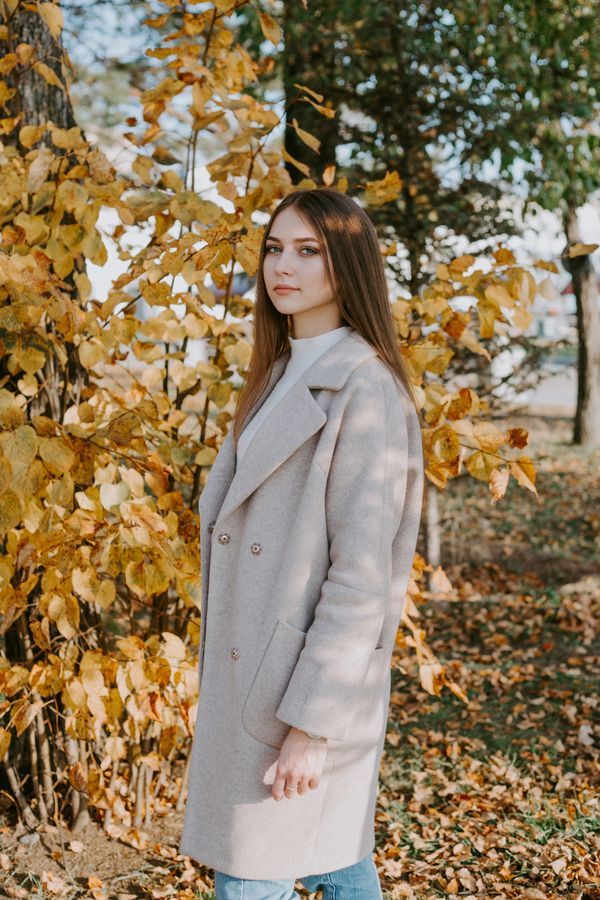 Dark wool coat with chunky scarf casual