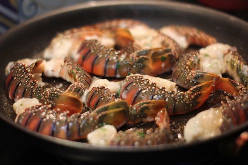 Cooking Shrimps over a Pan Griller