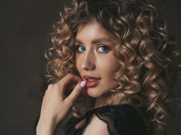 Side-swept elegant curls