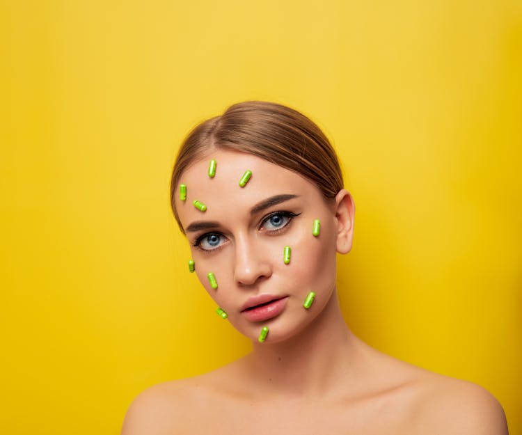 Pills On Face Of Woman