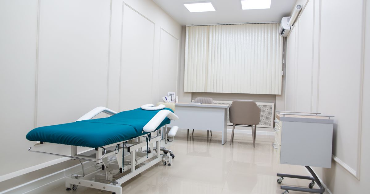 Contemporary medical office with treatment bed