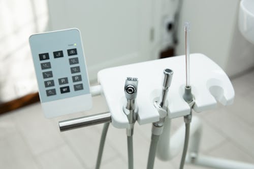 Stainless Steel Medical Tools on the White Holder