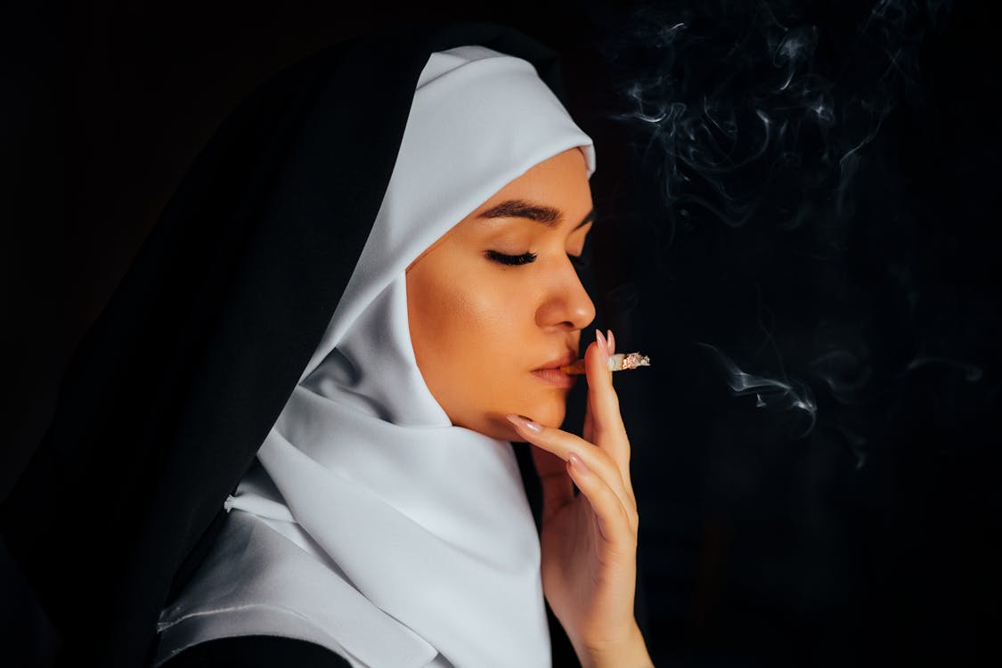 Woman Smoking Cigarette · Free Stock Photo
