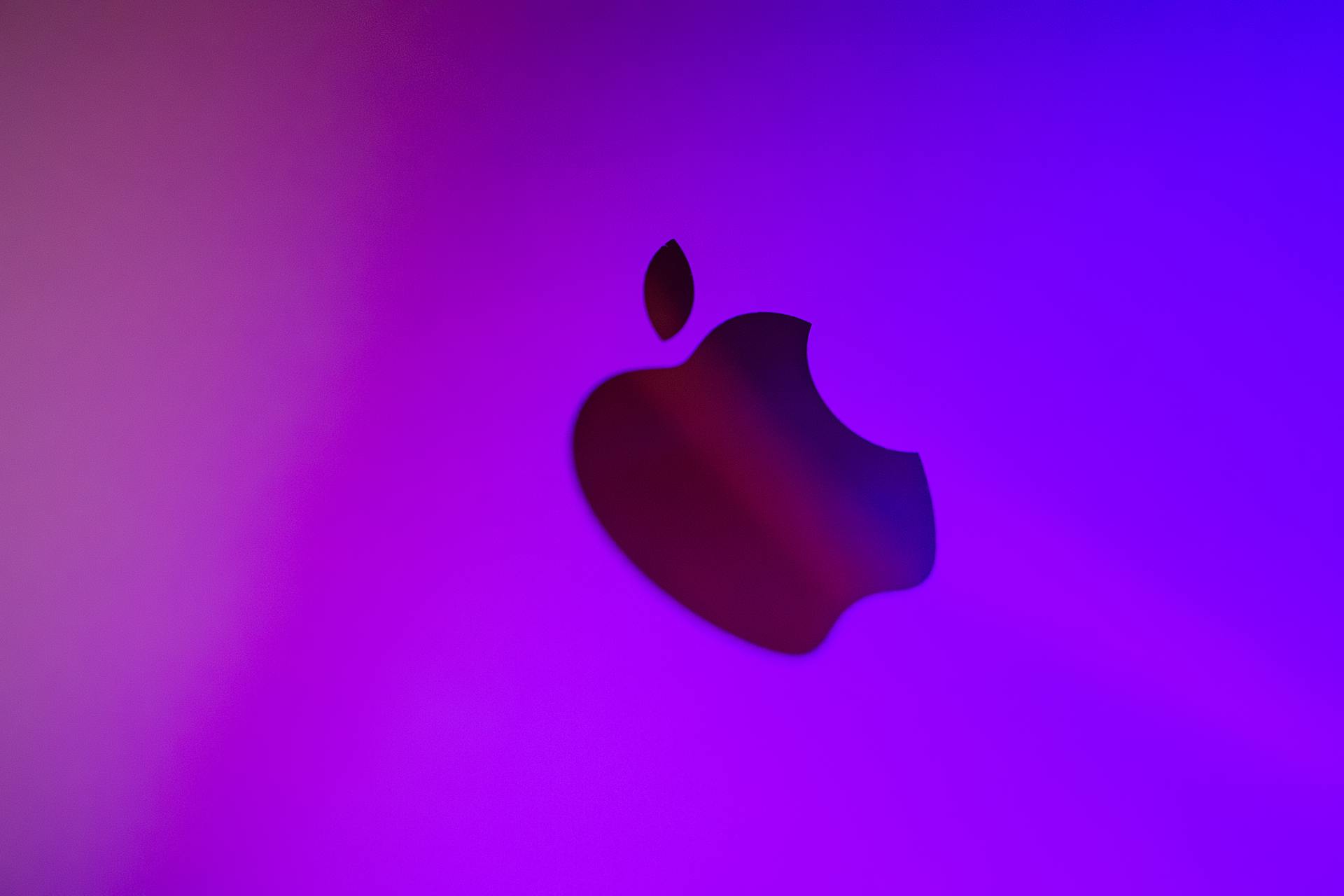 Apple Logo on Purple Background