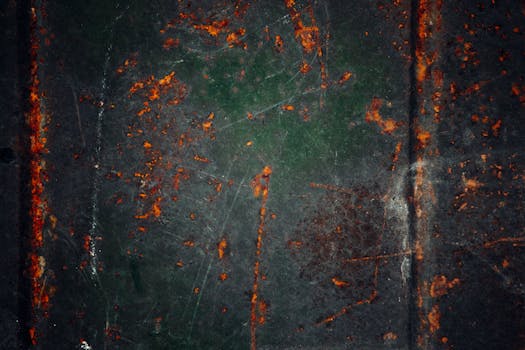 Close-up of rusted and decaying metal surface with an industrial texture.