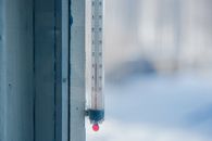 Clear Glass Thermometer on Gray Wooden Wall