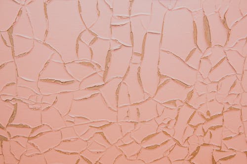 Concrete Wall with Pink Peeling Paint