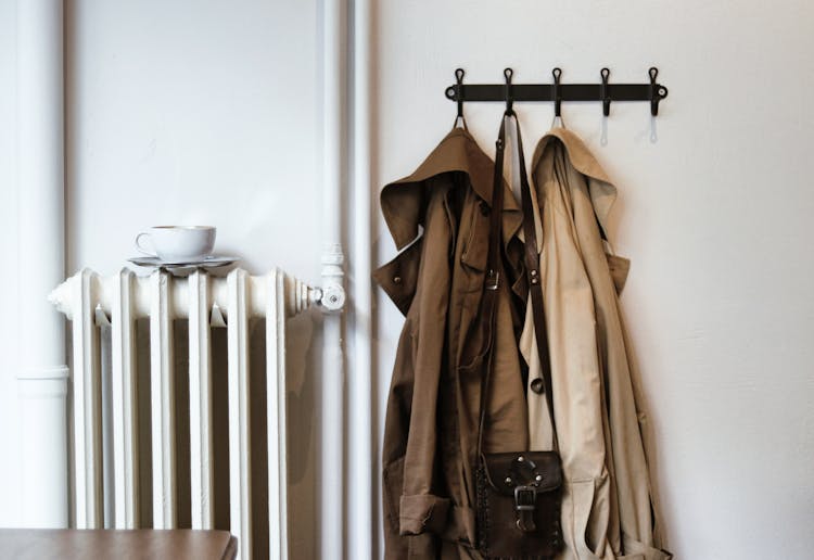 Coats And Shoulder Bag On Hooks In House