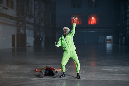 Man in Green Jersey Shirt and Pants