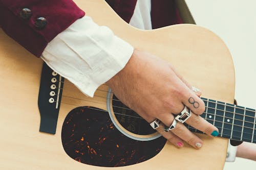 A Person Wearing Silver Rings