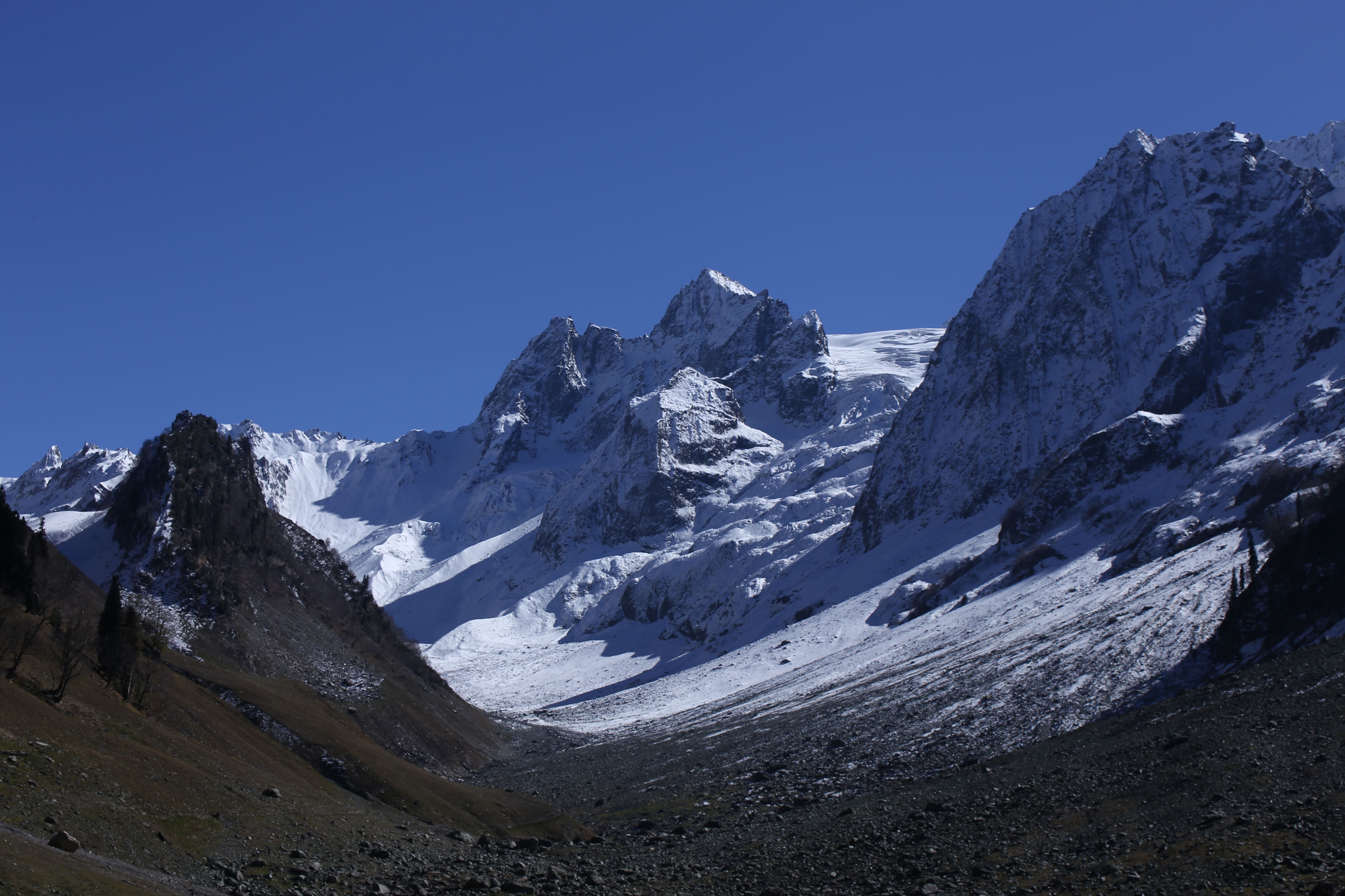 Snow Covered Mountains Under Blue Sky · Free Stock Photo