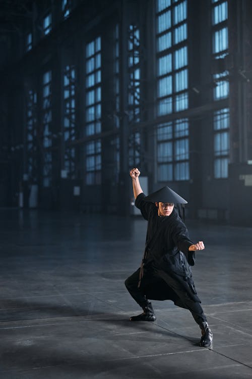 A Person in Black Hakama Dress