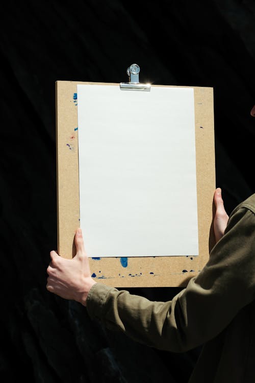 White Paper on Brown Cardboard