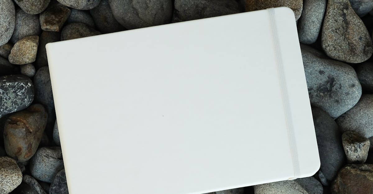 White Rectangular Notepad on the Ground · Free Stock Photo