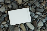 A White Board on a Rocky Ground