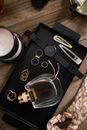 Black and Silver Bluetooth Earphones on Black Textile