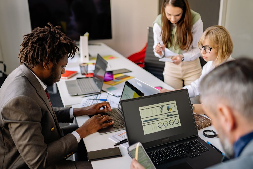 Small team collaborating at a table