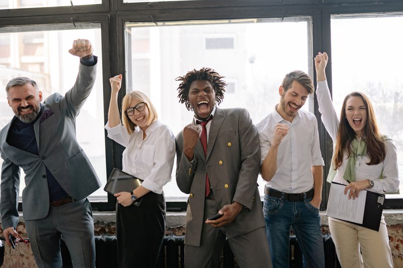 Office team high-fiving