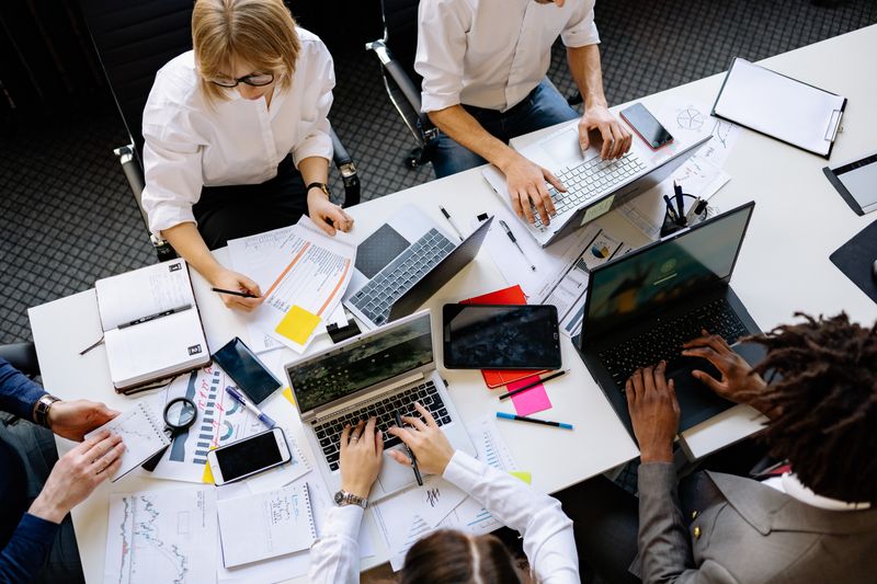 Research team collaborating around a table — Yan Krukau on Pexels