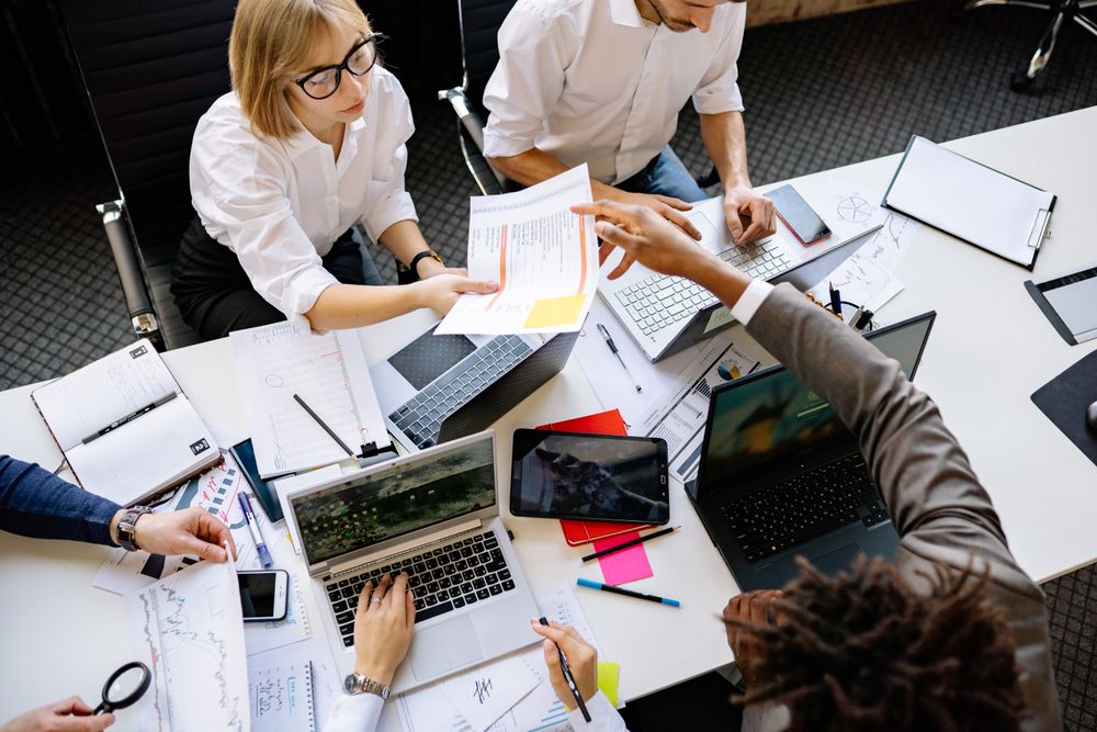 Small team collaborating at a table