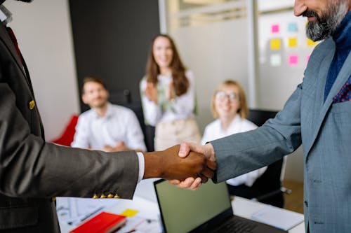 Free Close Up Shot of 2 Person Shake Hands Stock Photo