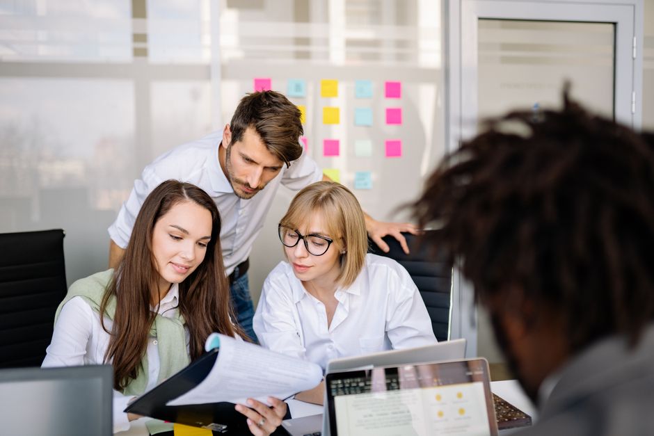 team reviewing content strategy meeting