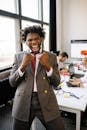 An Elated Businessman in the Office