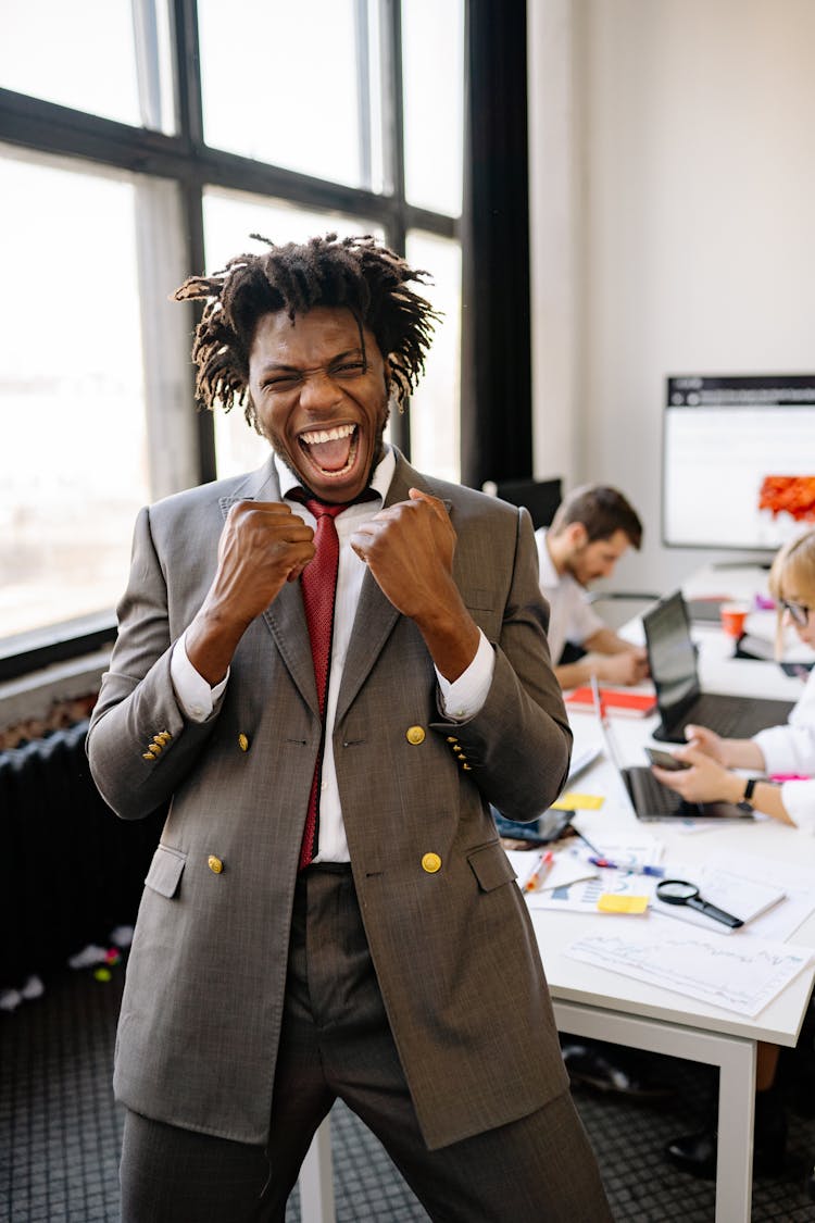 An Elated Businessman In The Office