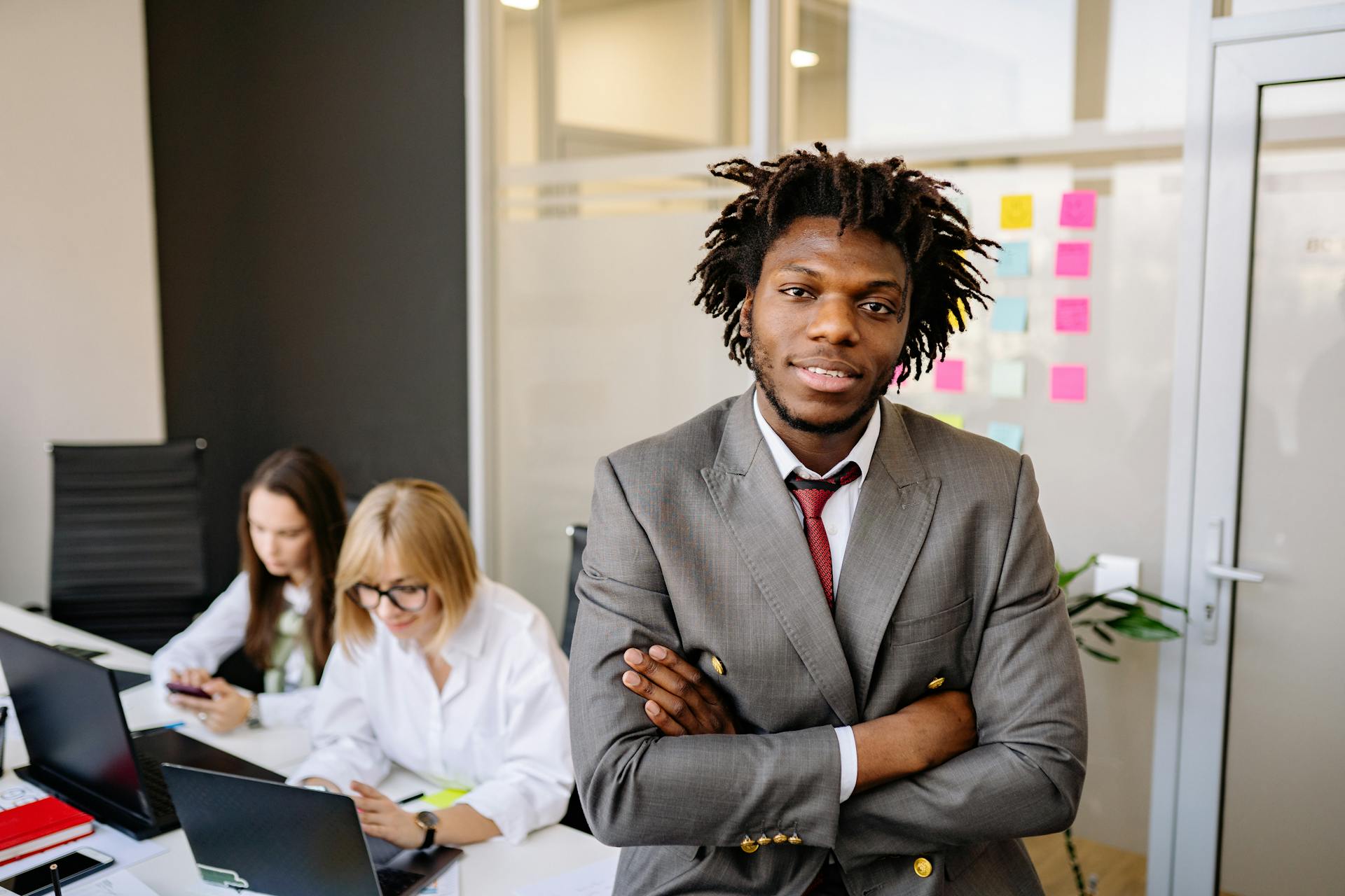 A Businessman and His Colleagues in the Office