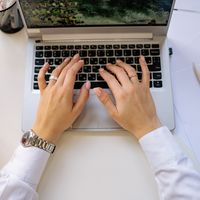 Hands typing on a laptop keyboard — photo by Yan Krukau on Pexels