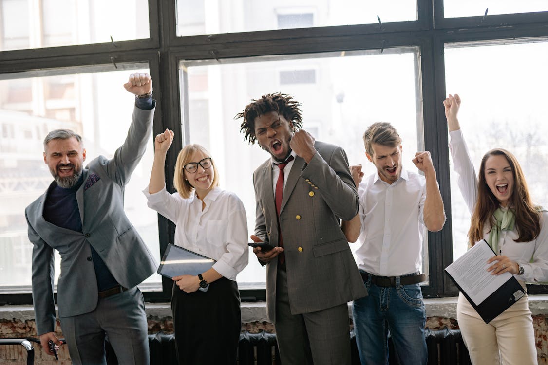 Free People Celebrating at the Office Stock Photo