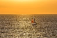 Sailboat on Body of Water