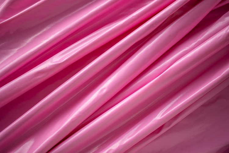 Crumpled Pink Fabric With Wavy Lines