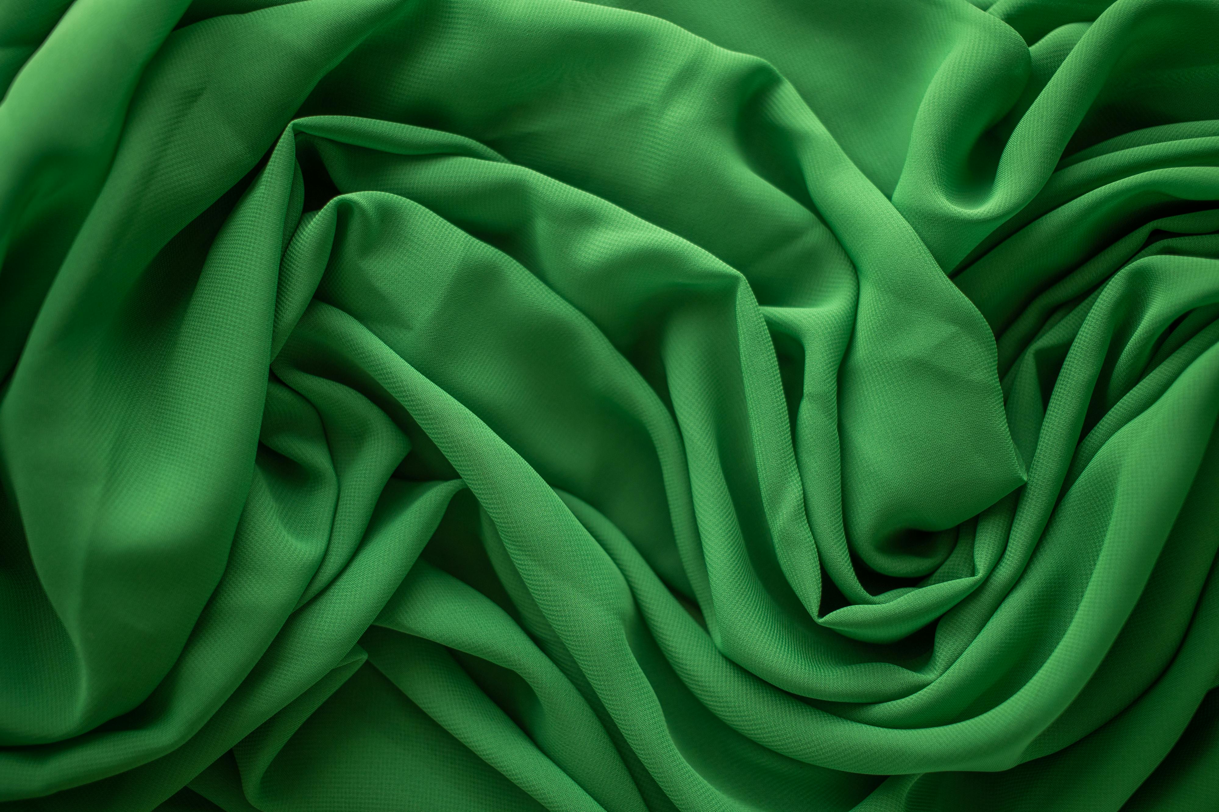 Green abstract background of fabric · Free Stock Photo