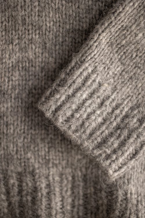 Closeup of knitted sweater sleeve