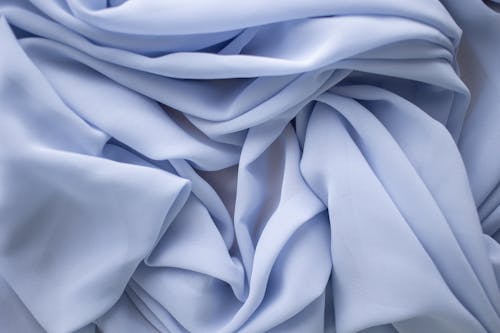 Close-Up Shot of a Wrinkled Light Blue Fabric