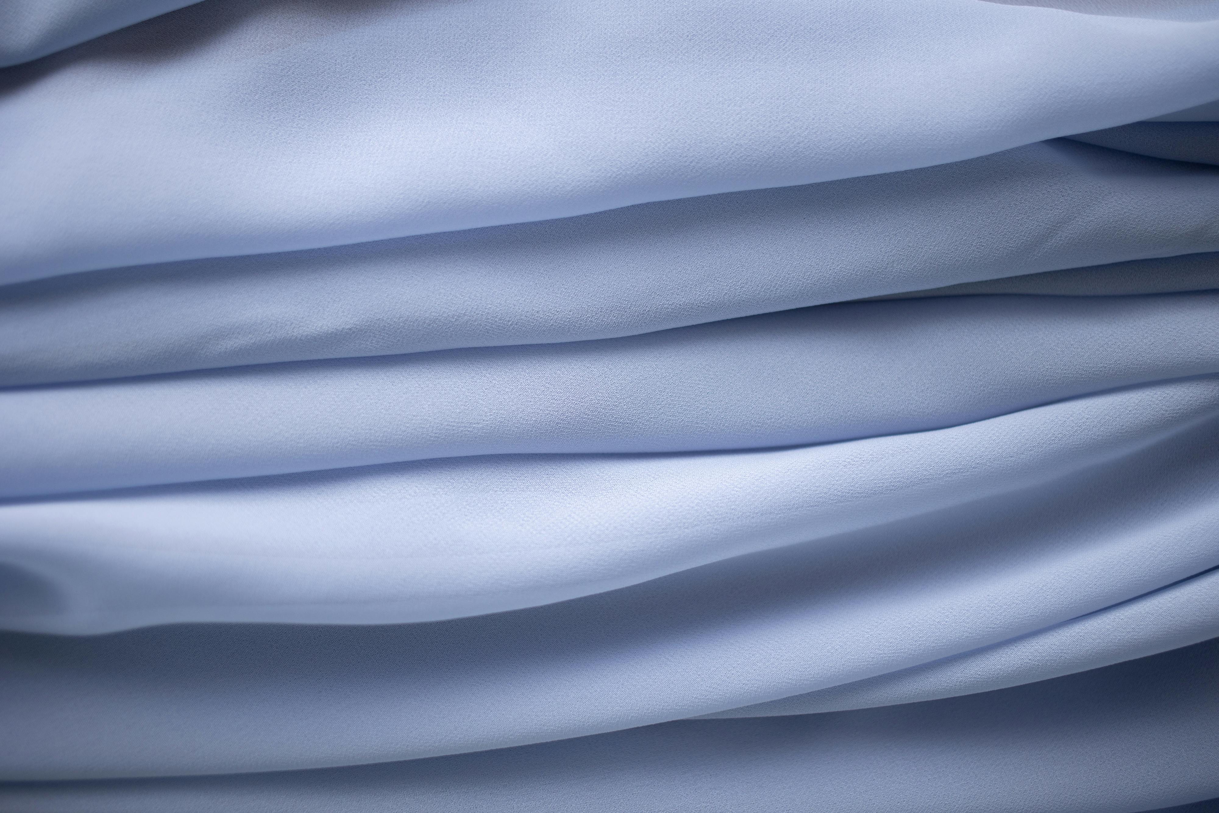 Close up of bright blue fabric texture