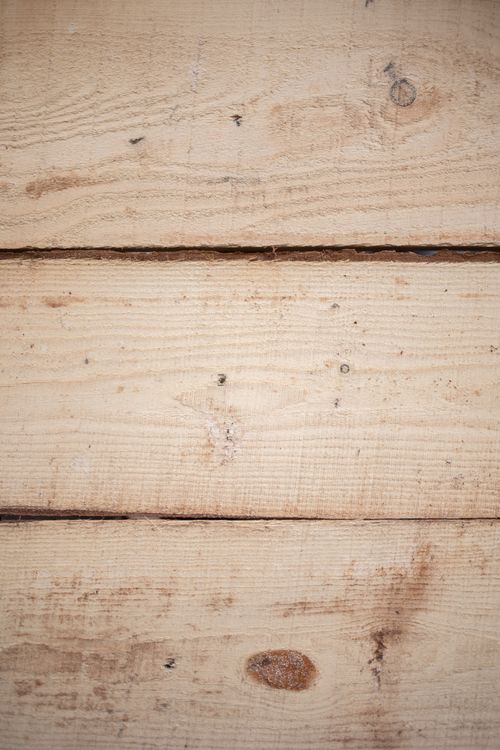 Free Detailed close-up image of natural wood planks showcasing texture and grain for backgrounds. Stock Photo