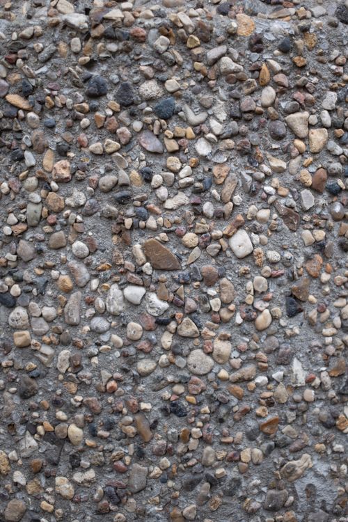 Free Top view of textured background representing rough stones and multicolored rubble on ground Stock Photo