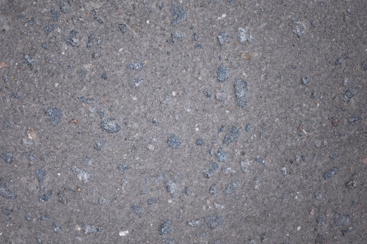 Uneven Surface Of Asphalt Road