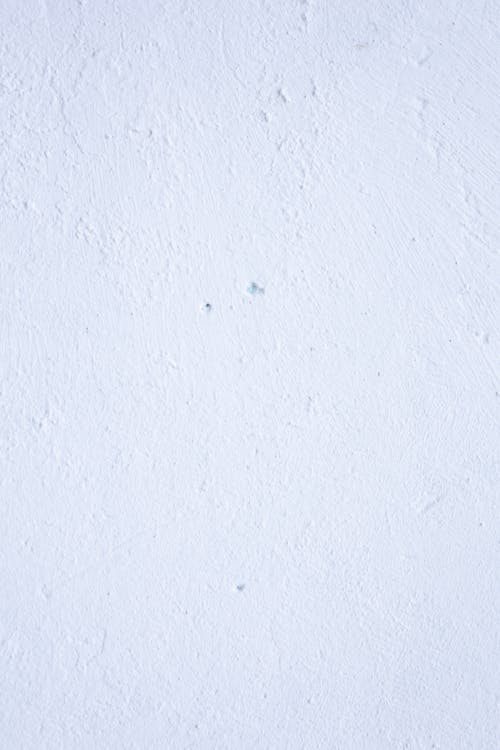 Background of light blue plaster wall
