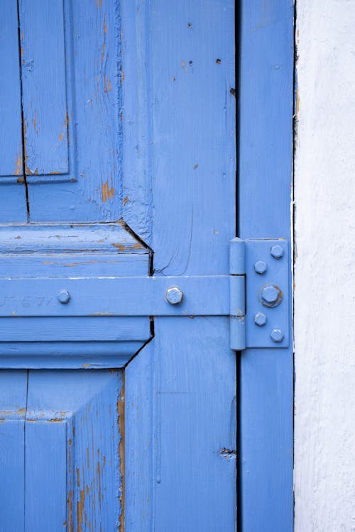 Aged door of blue color