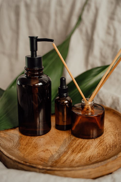 Pump Bottle on Brown Wooden Tray