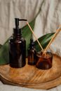 Pump Bottle on Brown Wooden Tray