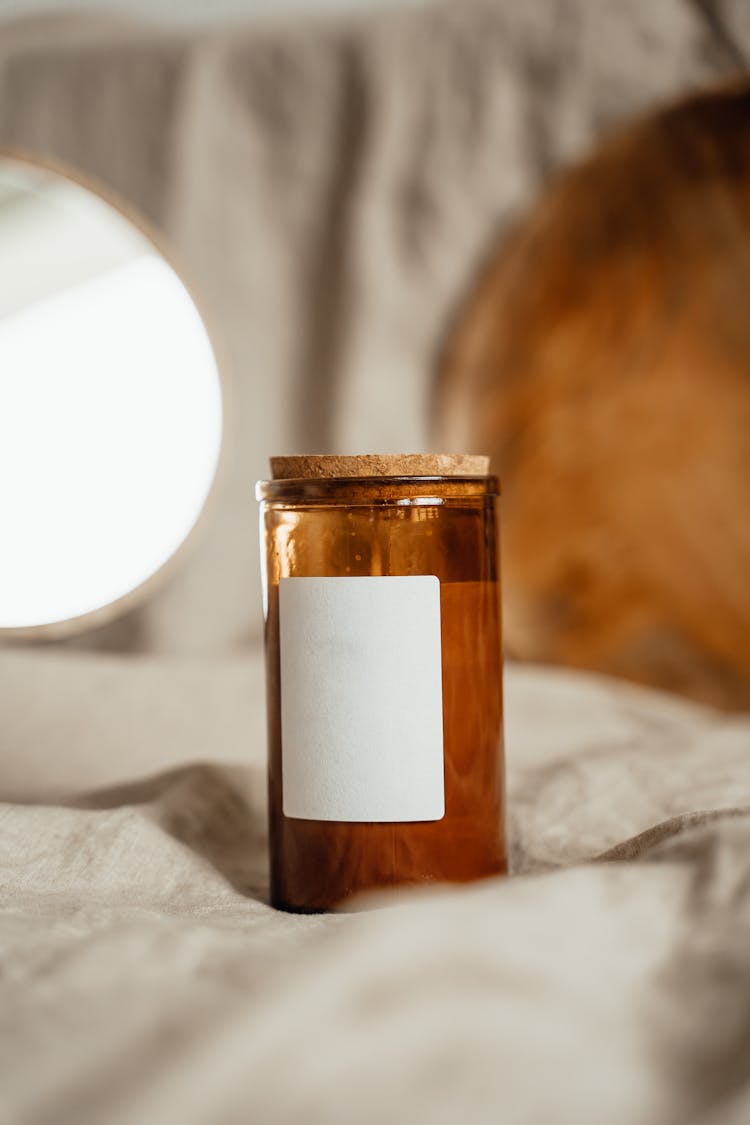 Brown Glass Jar With A Blank Label