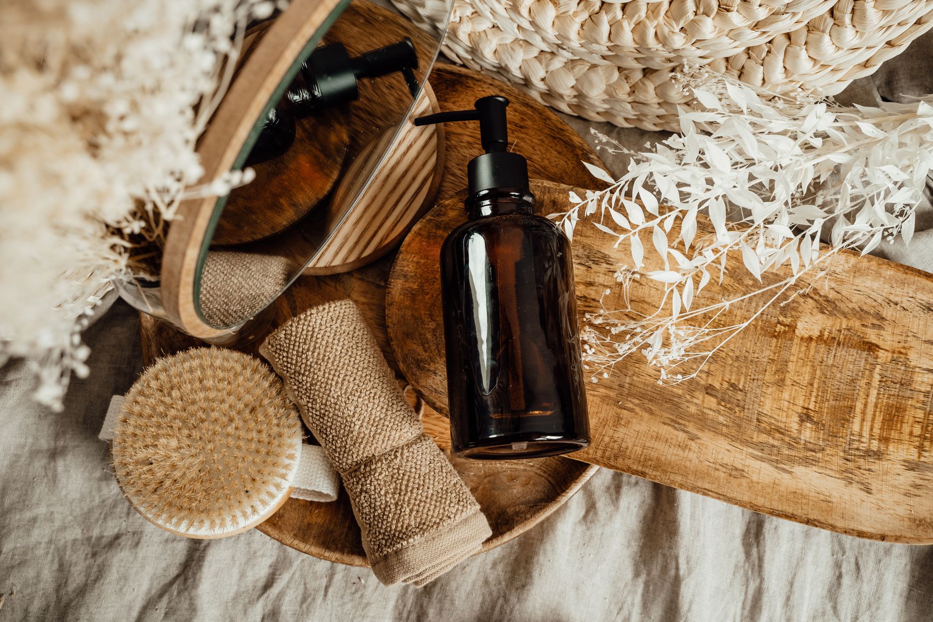 Top Skincare Products For Your Morning Routine 1 Top View of Composition of Bathroom Supplies Lying on a Wooden Tray